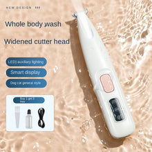 Load image into Gallery viewer, Pet nail and paw hair trimmer in use


